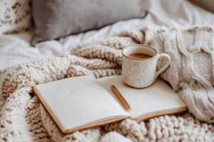 open notebook with coffee