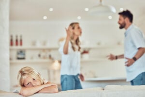 parents arguing in front of child