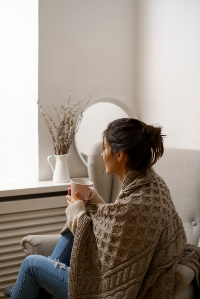 woman drinking coffee before meeting with relationship therapist
